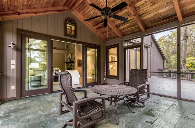 a outdoor living space with furniture and a large window