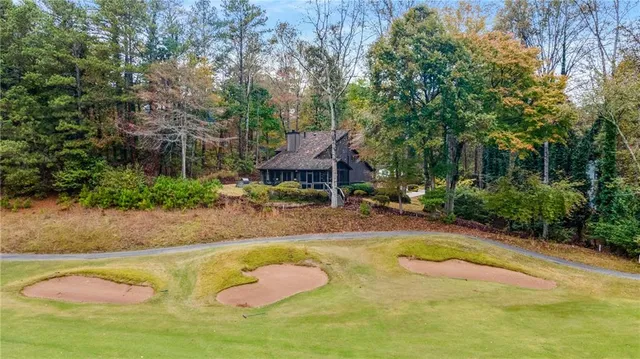 an aerial view of residential house with outdoor space