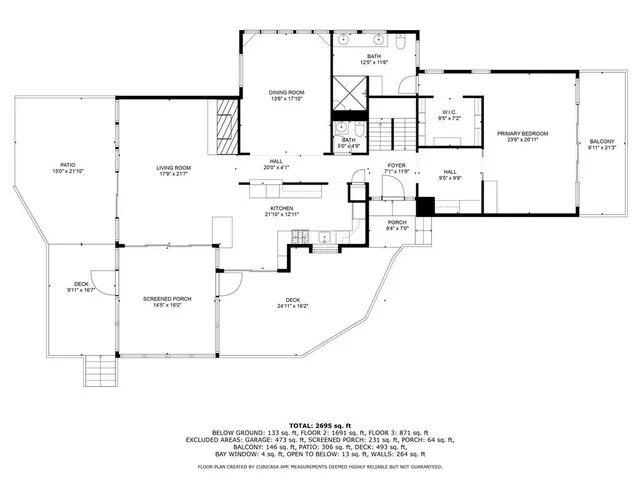 a kitchen with stainless steel appliances granite countertop a stove a refrigerator and a sink