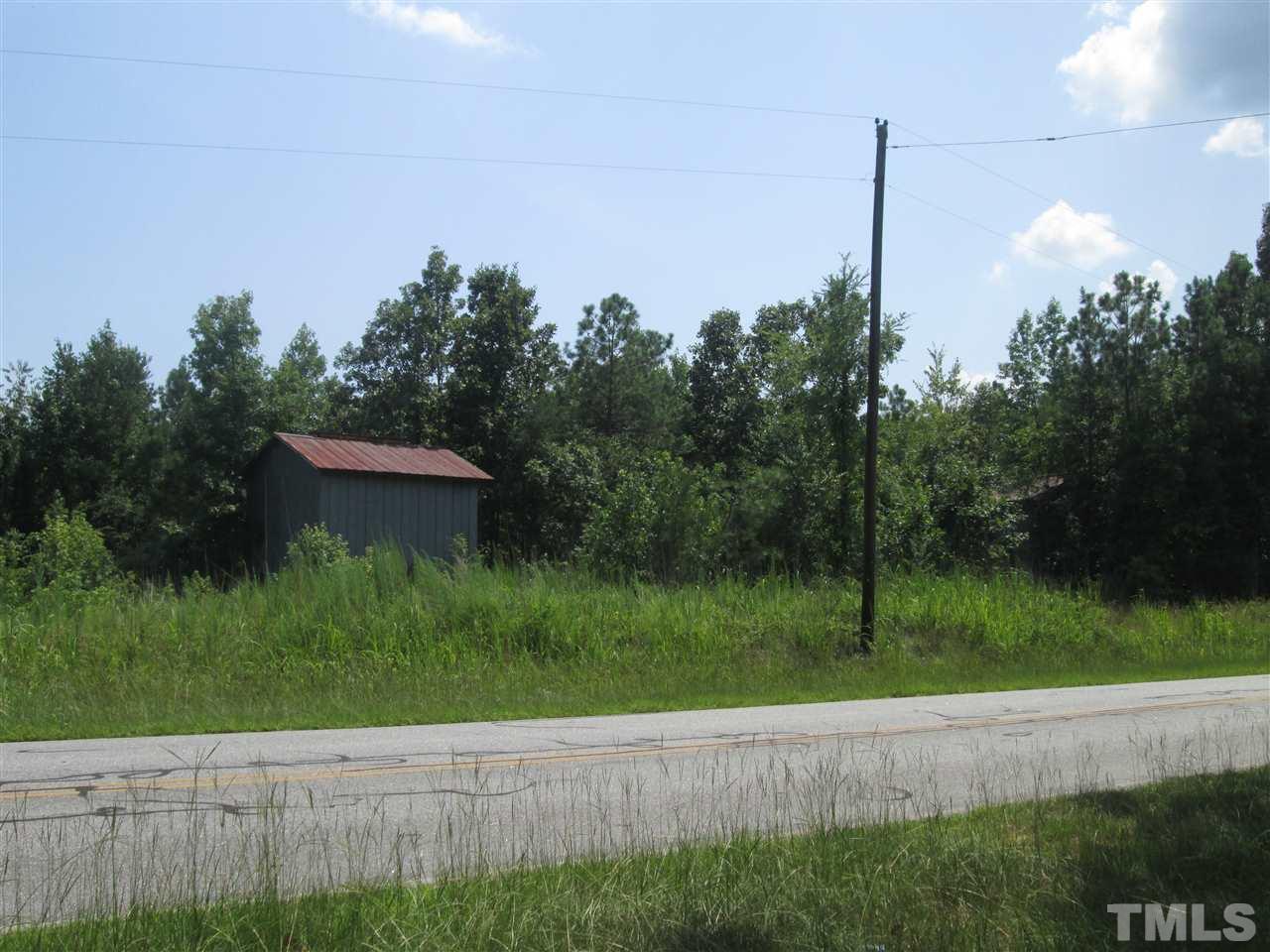 Horseshoe Road Creedmoor, NC 27522 - Photo 6 of 11 a backyard of a house with lots of green space