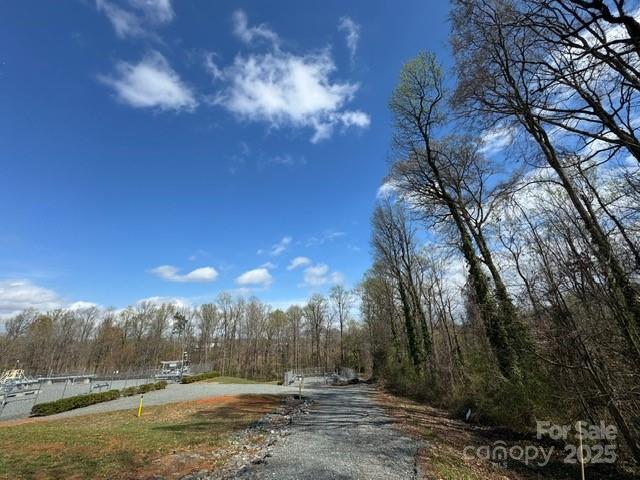 2015 C Avenue Charlotte, NC 28216 - Photo 16 of 25 a view of a yard with a trees