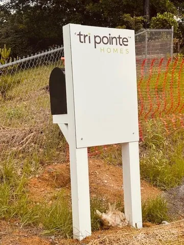 a view of a chairs and table in the patio