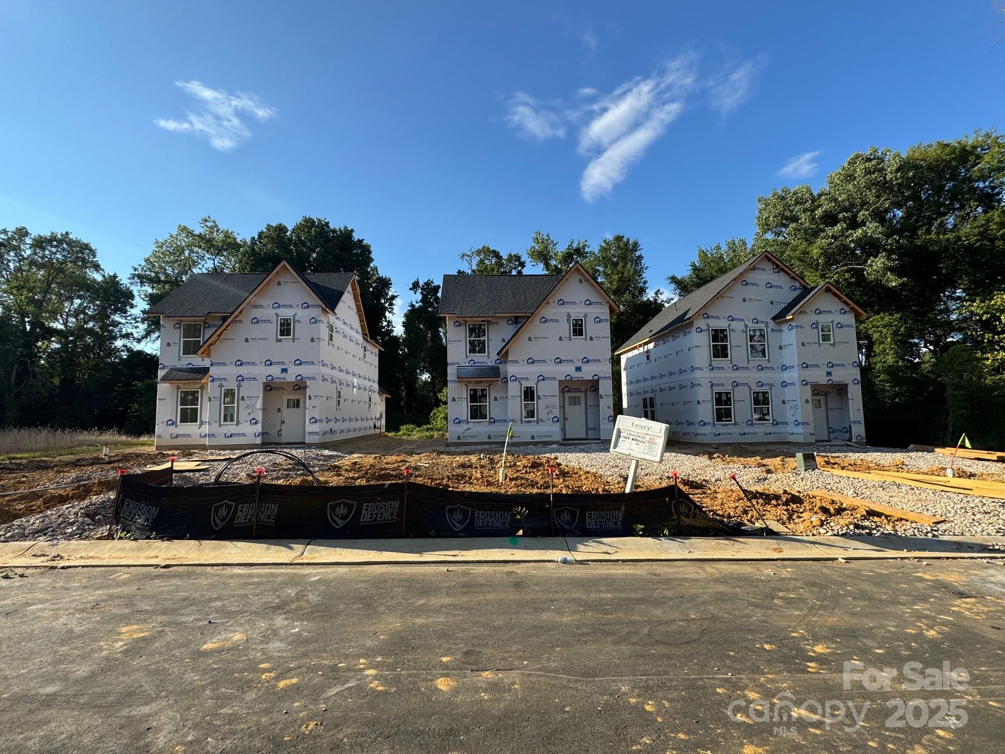 2015 C Avenue Charlotte, NC 28216 - Photo 23 of 25 a front view of a house with a yard