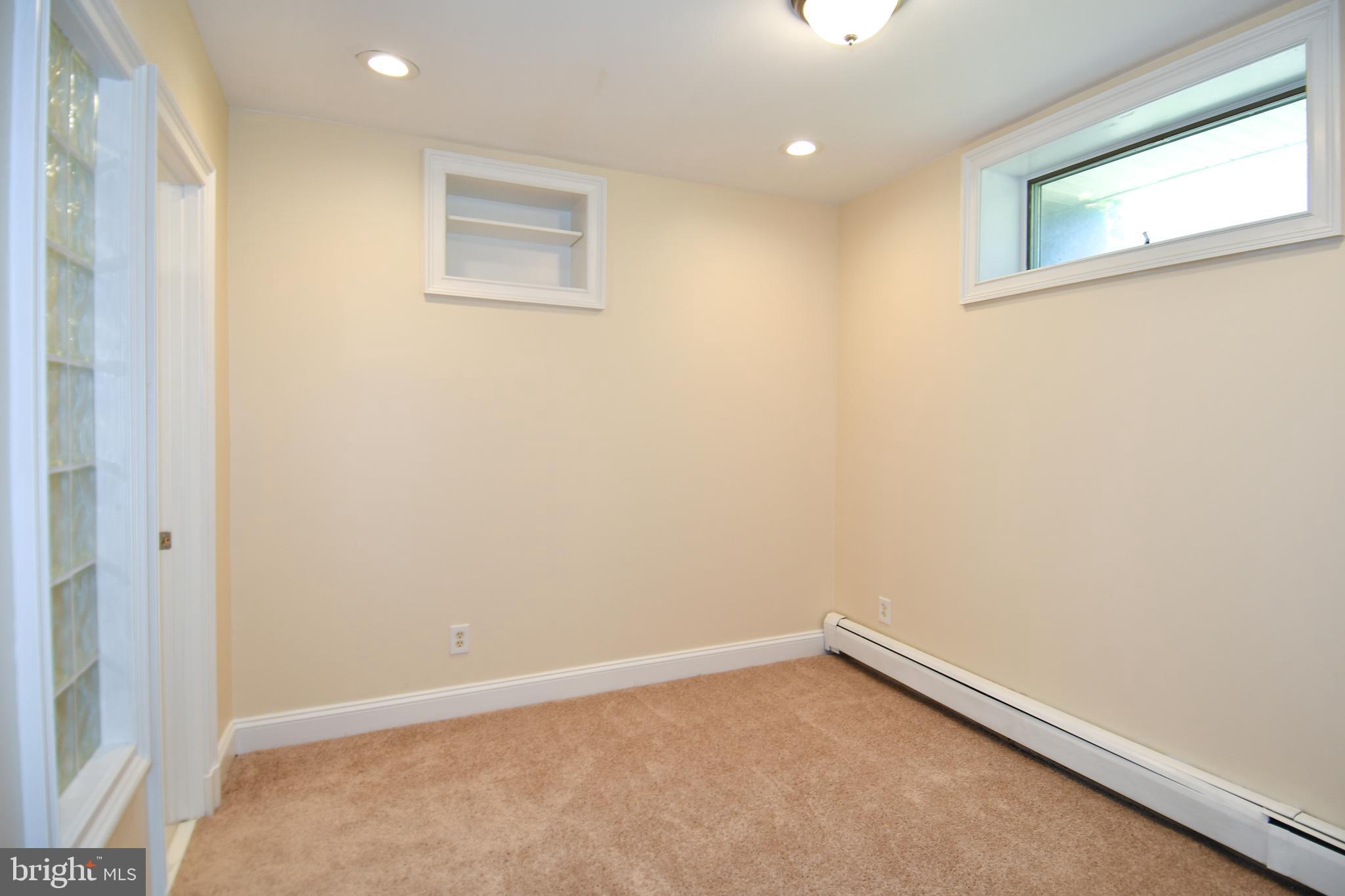 7011 Old Sandy Spring Road Laurel, MD 20707 - Photo 26 of 39 Basement Bedroom