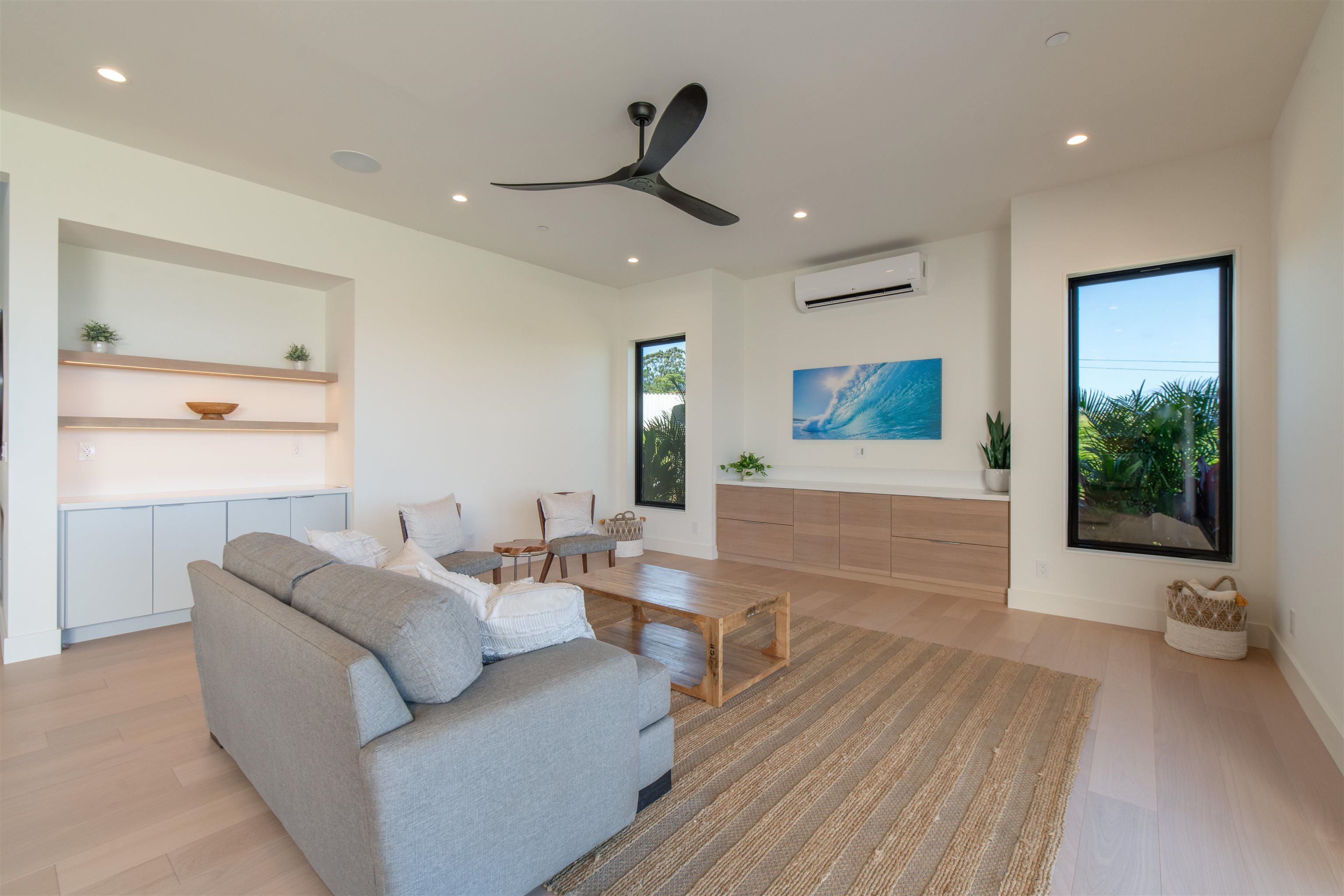 111 Mehana Road, Unit A Haiku, HI 96708 - Photo 20 of 50 a living room with furniture and a large window