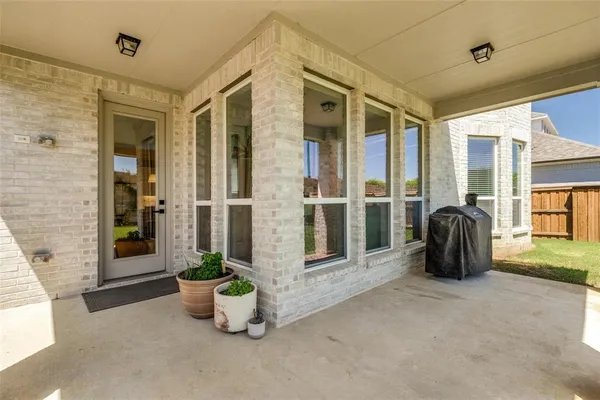 a view of a entryway door front of house