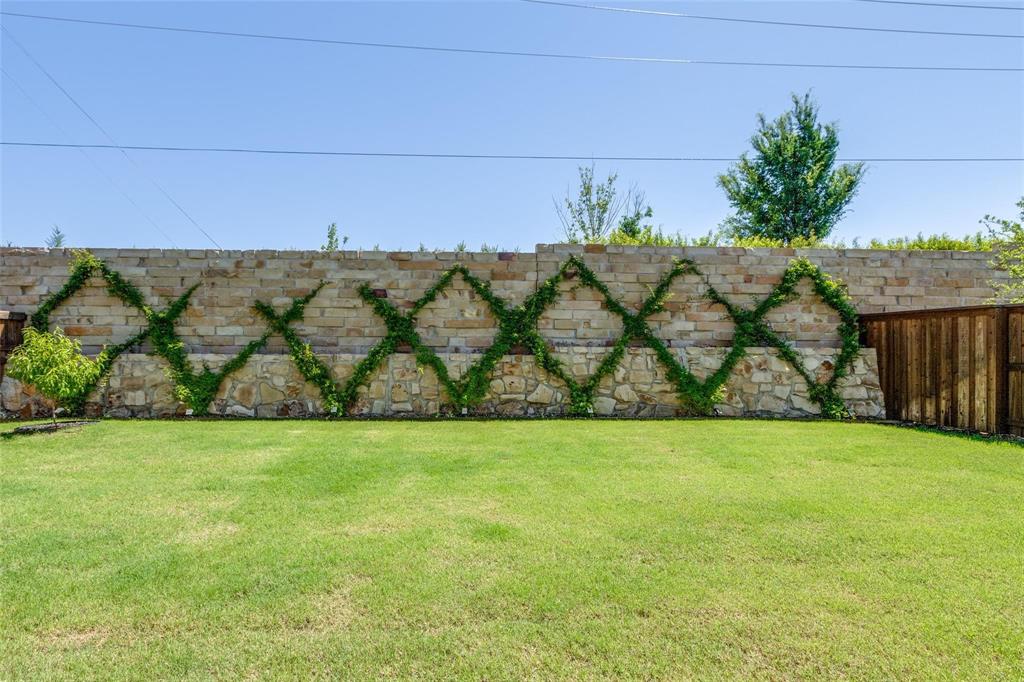 1000 Adair Road Prosper, TX 75078 - Photo 34 of 38 EIGHT FOOT back wall with stunning privacy given the occupants.