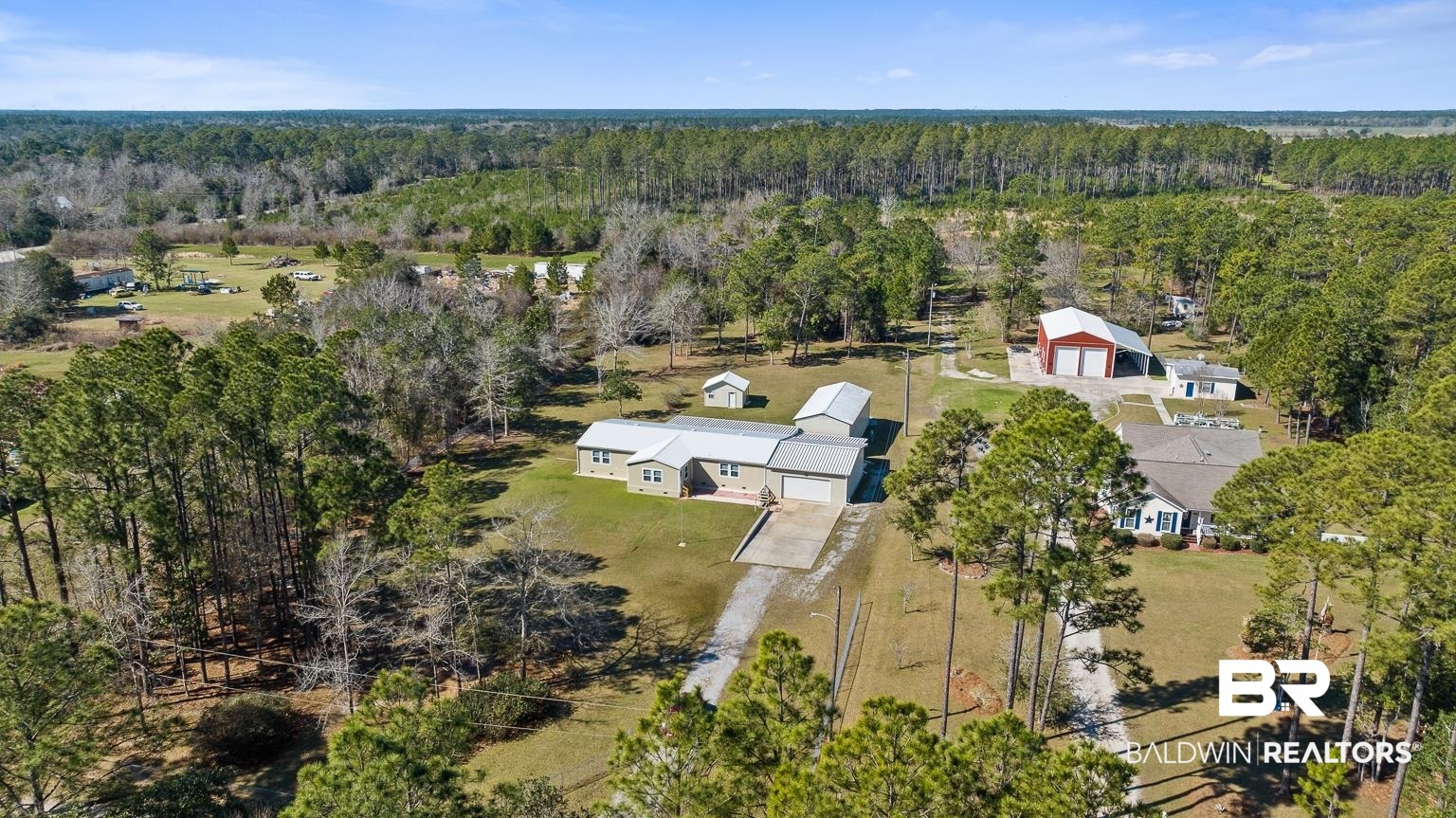 10647 Rte Road Lillian, AL 36549 - Photo 2 of 62 Bird's eye view featuring a view of trees