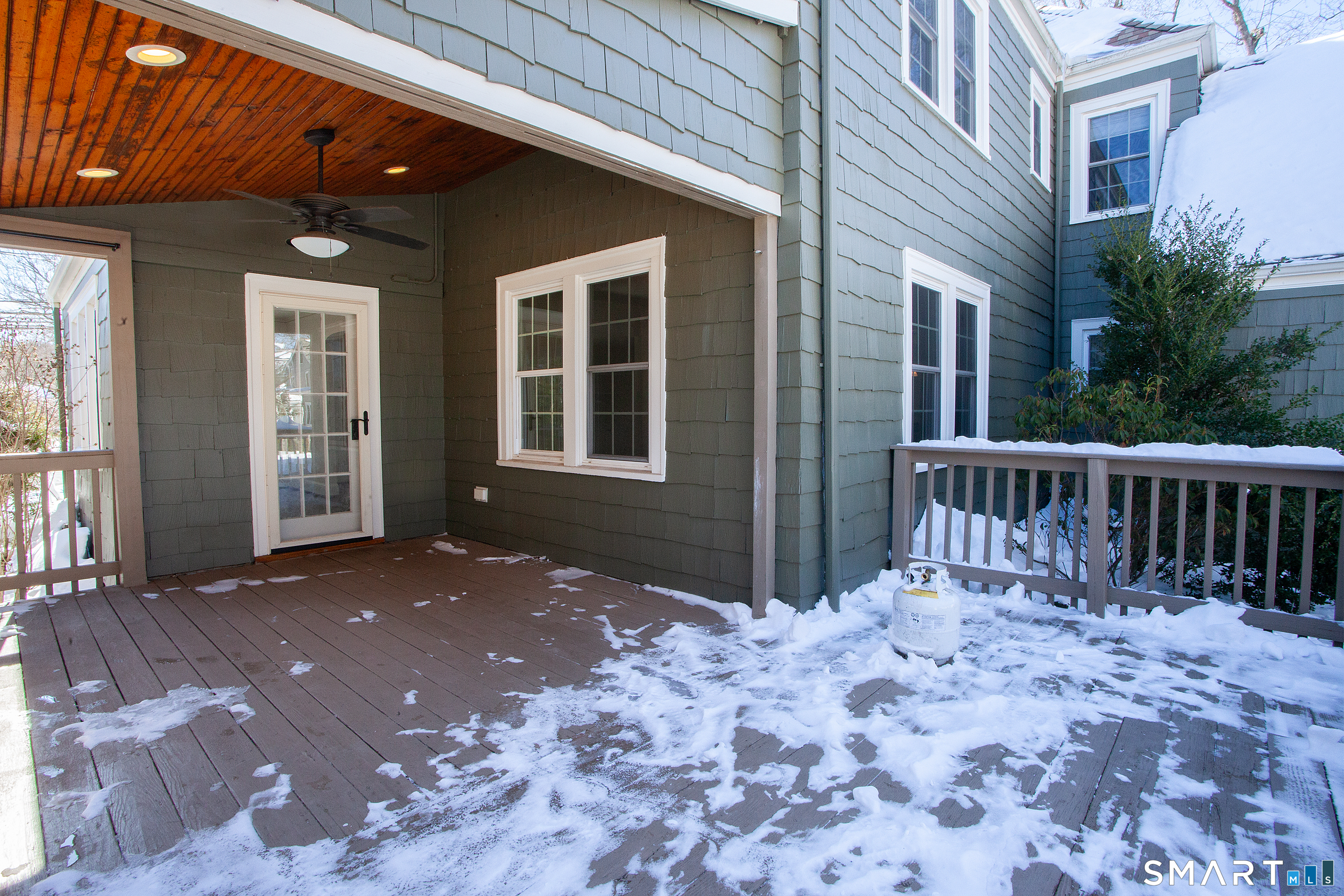 30 Sedgwick Road West Hartford, CT 06107 - Photo 36 of 40 the covered portion of the deck has a fan and recessed lighting