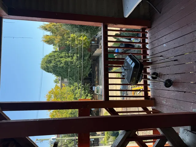a view of wooden floor with a small stove