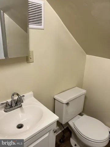 a bathroom with a shower and a bath tub