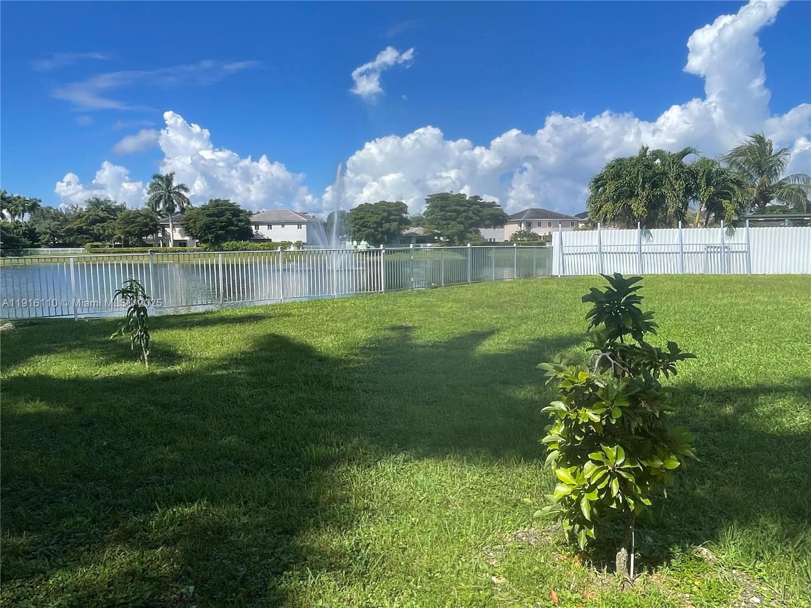 3102 Northeast 3rd Drive Homestead, FL 33033 - Photo 29 of 33 a view of a golf course with a lake