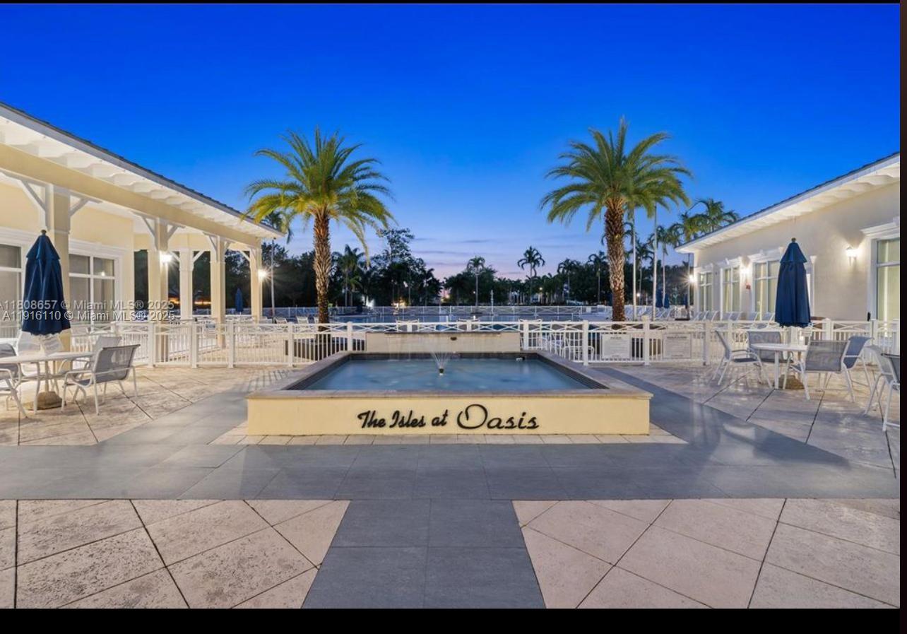 3102 Northeast 3rd Drive Homestead, FL 33033 - Photo 30 of 33 a view of swimming pool with outdoor seating