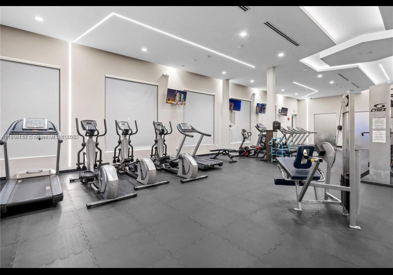 3102 Northeast 3rd Drive Homestead, FL 33033 - Photo 33 of 33 a view of a room with gym equipment