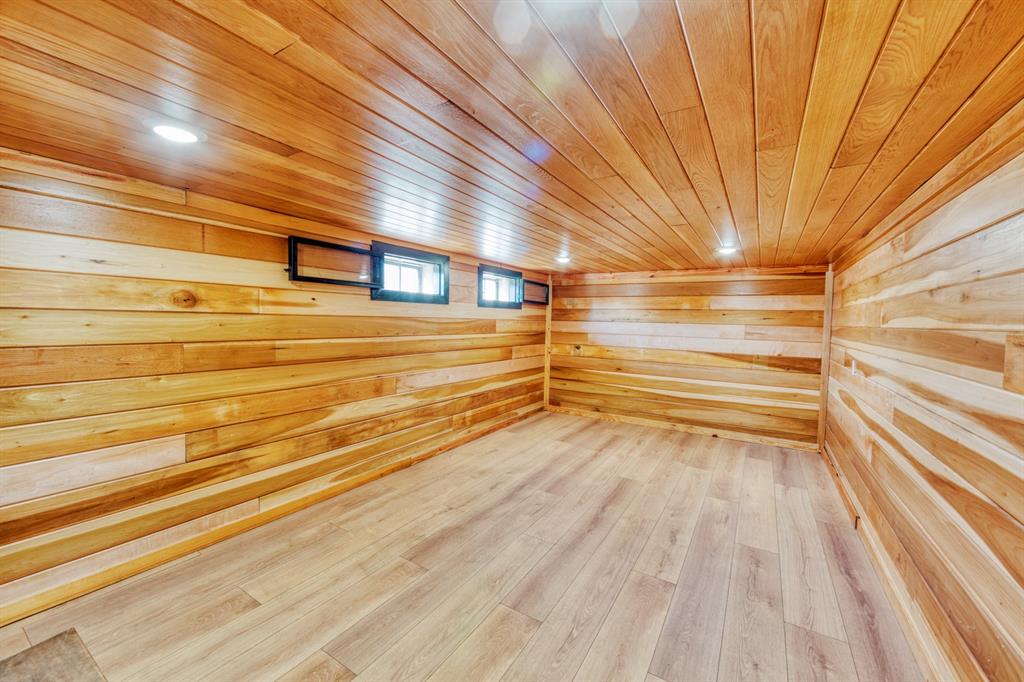 808 North Main Street Tioga, TX 76271 - Photo 20 of 23 a view of empty room with wooden floor