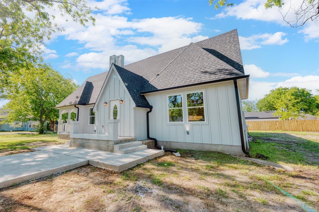 808 North Main Street Tioga, TX 76271 - Photo 23 of 23 a view of a house with backyard