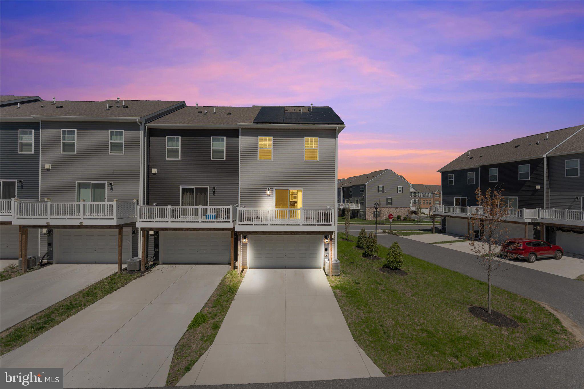 9611 Silver Bluff Way Bowie, MD 20721 - Photo 32 of 33 a view of a house with a swimming pool