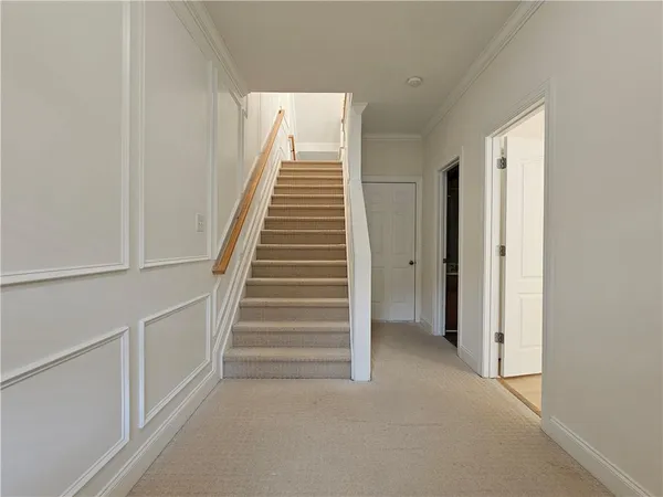 a view of an entryway with staircase
