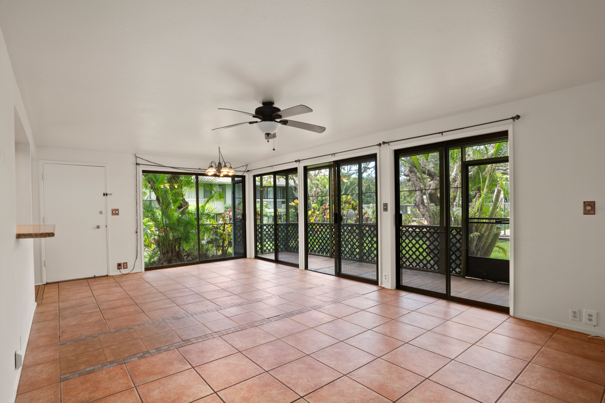 3057 Poipu Road, Unit A1 Koloa, HI 96756 - Photo 5 of 19 a view of an empty room with a balcony
