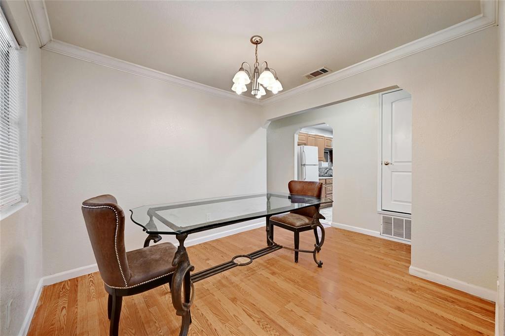 3312 Plantation Road Austin, TX 78745 - Photo 3 of 10 a living room with furniture and a wooden floor