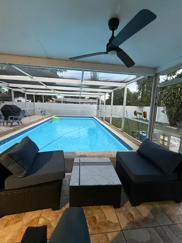 a view of a bench in backyard