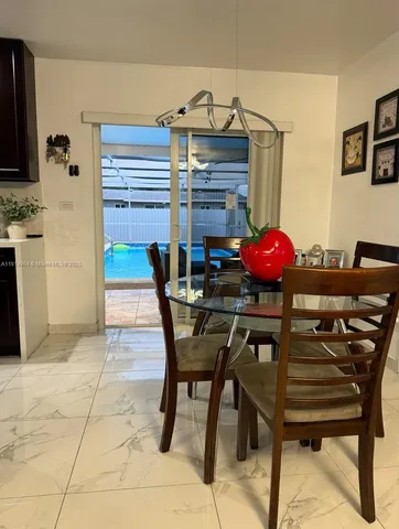 a utility room with washer and dryer
