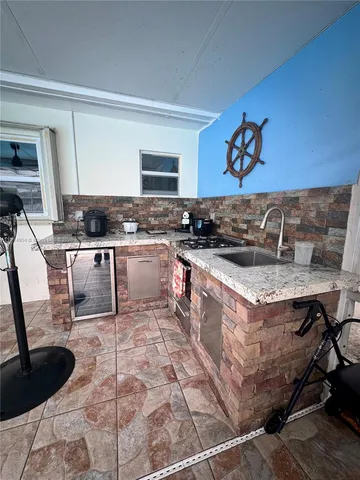 a view of a pathway with a wrought fence