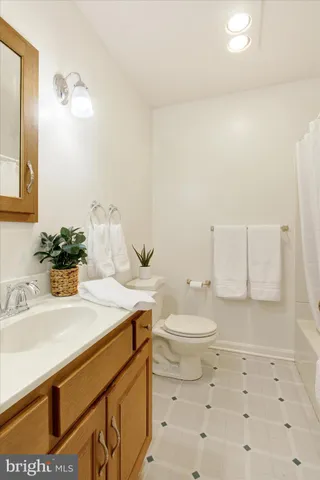 a view of an empty room with stairs