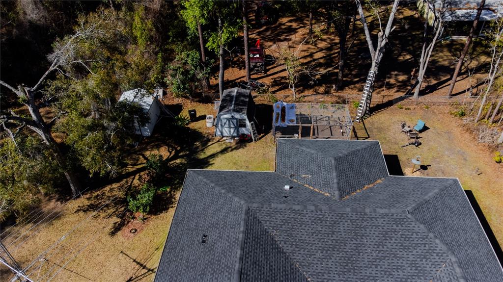 4150 South Apopka Avenue Inverness, FL 34452 - Photo 14 of 84 an aerial view of residential houses with outdoor space