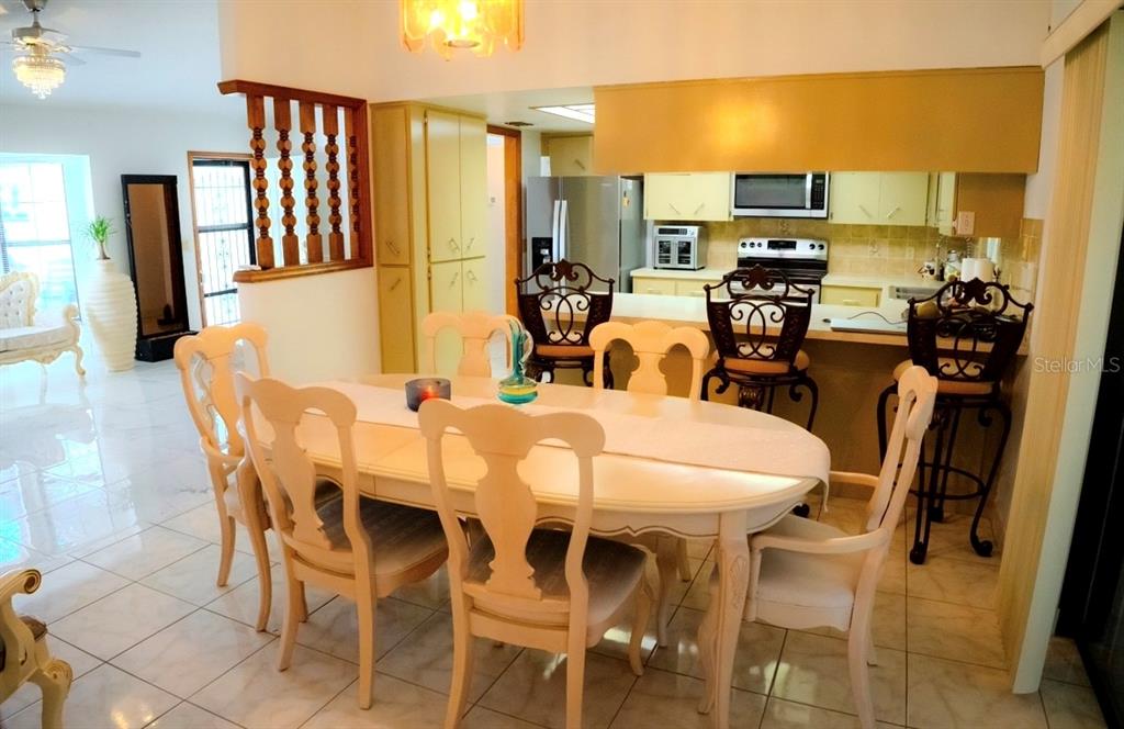 4150 South Apopka Avenue Inverness, FL 34452 - Photo 24 of 84 a view of a dining room with furniture