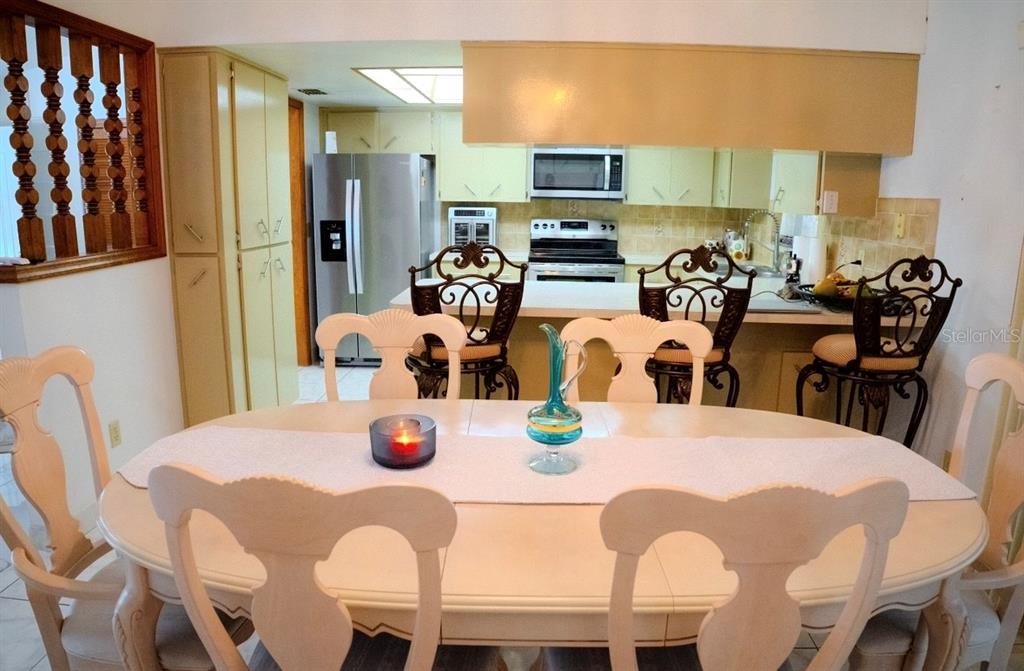 4150 South Apopka Avenue Inverness, FL 34452 - Photo 25 of 84 a view of a dining room with furniture
