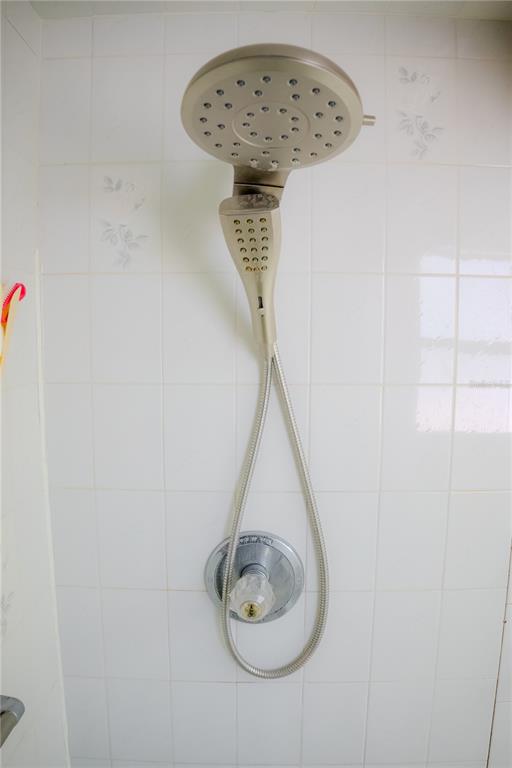 4150 South Apopka Avenue Inverness, FL 34452 - Photo 45 of 84 a picture of a room with a wall painting and a fan