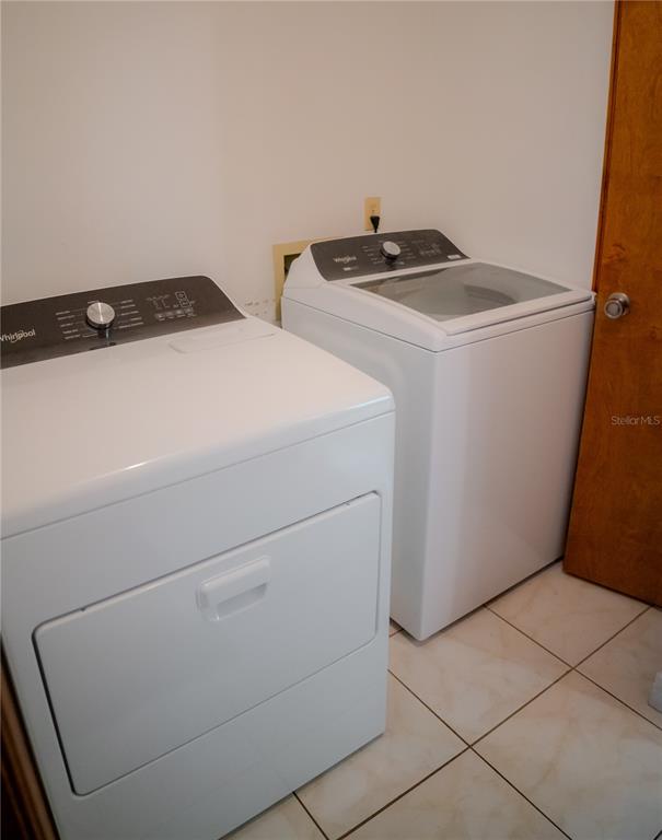 4150 South Apopka Avenue Inverness, FL 34452 - Photo 61 of 84 a utility room with dryer and washer
