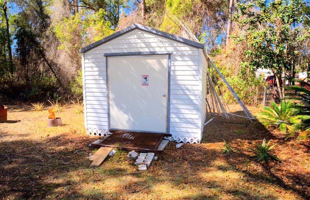 4150 South Apopka Avenue Inverness, FL 34452 - Photo 65 of 84 a view of wooden house with a yard