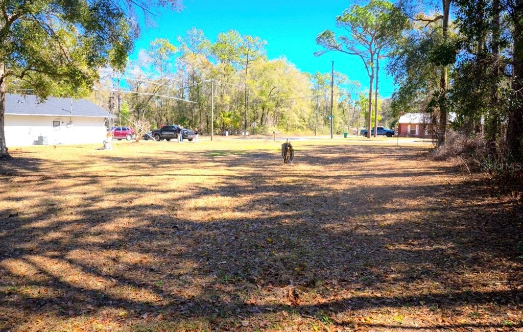 4150 South Apopka Avenue Inverness, FL 34452 - Photo 72 of 84 a view of road with large trees