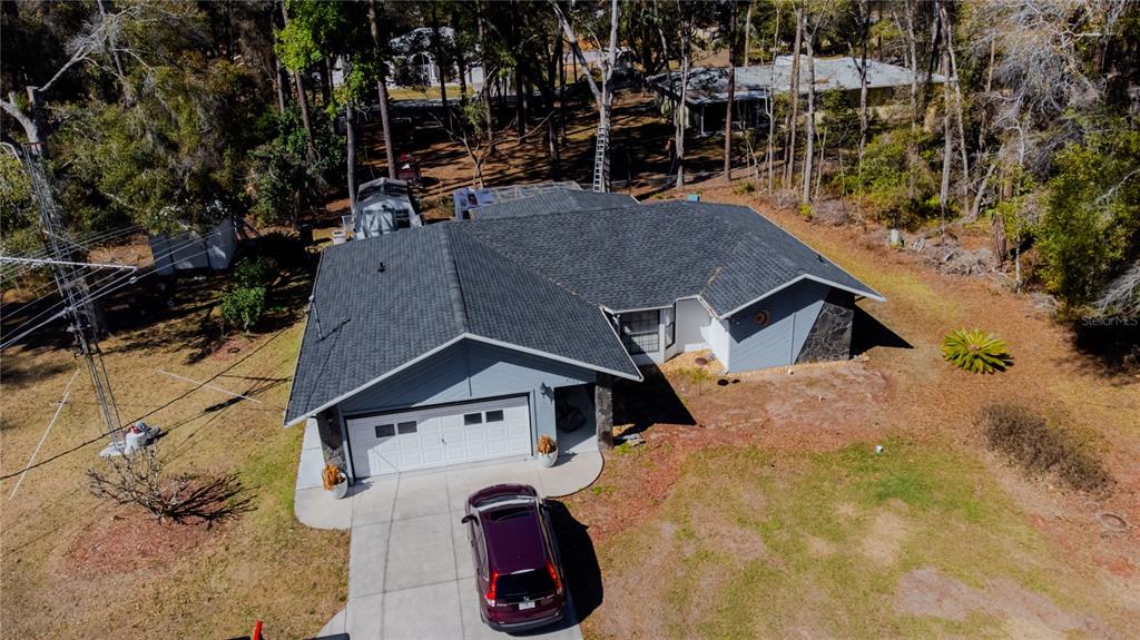 4150 South Apopka Avenue Inverness, FL 34452 - Photo 8 of 84 an aerial view of a house with a yard