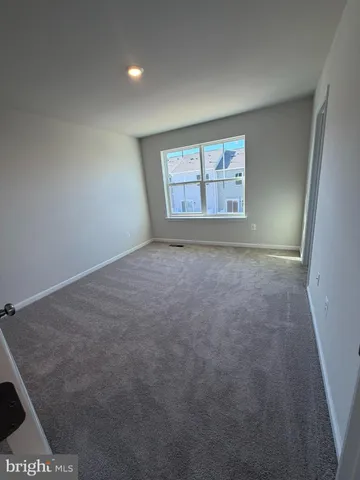 a bathroom with a double vanity sink and mirror