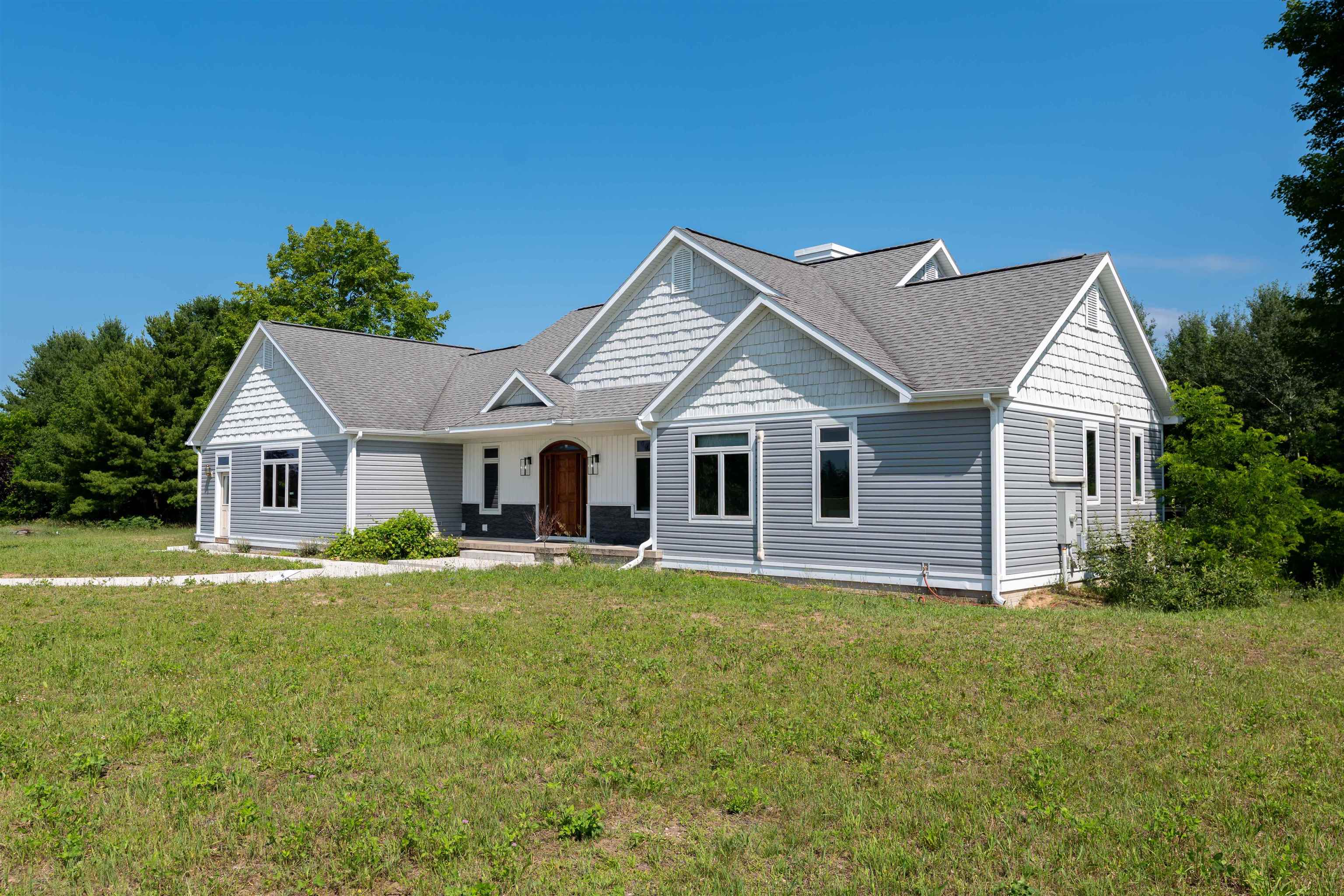 8255 Angell Road Williamsburg, MI 49690 - Photo 1 of 39 1947611-069c507c-0d20-4d75-929e-8946f7188ee9.JPG