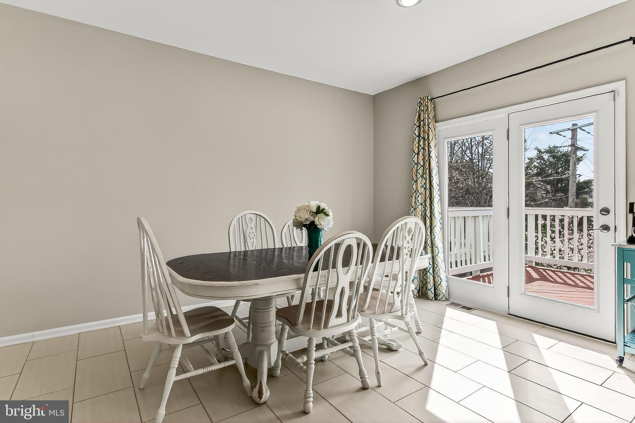 43473 Hopestone Terrace Chantilly, VA 20152 - Photo 22 of 49 a dining room with furniture and chandelier