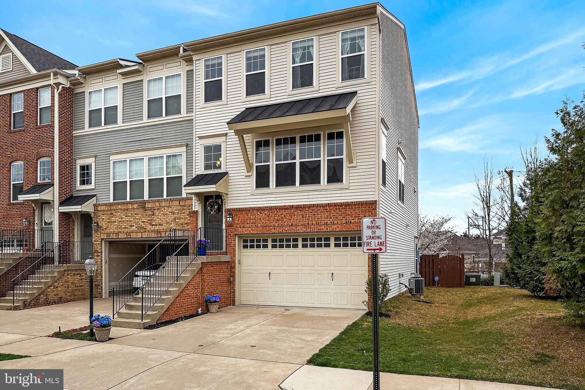 43473 Hopestone Terrace Chantilly, VA 20152 - Photo 3 of 49 a front view of a building