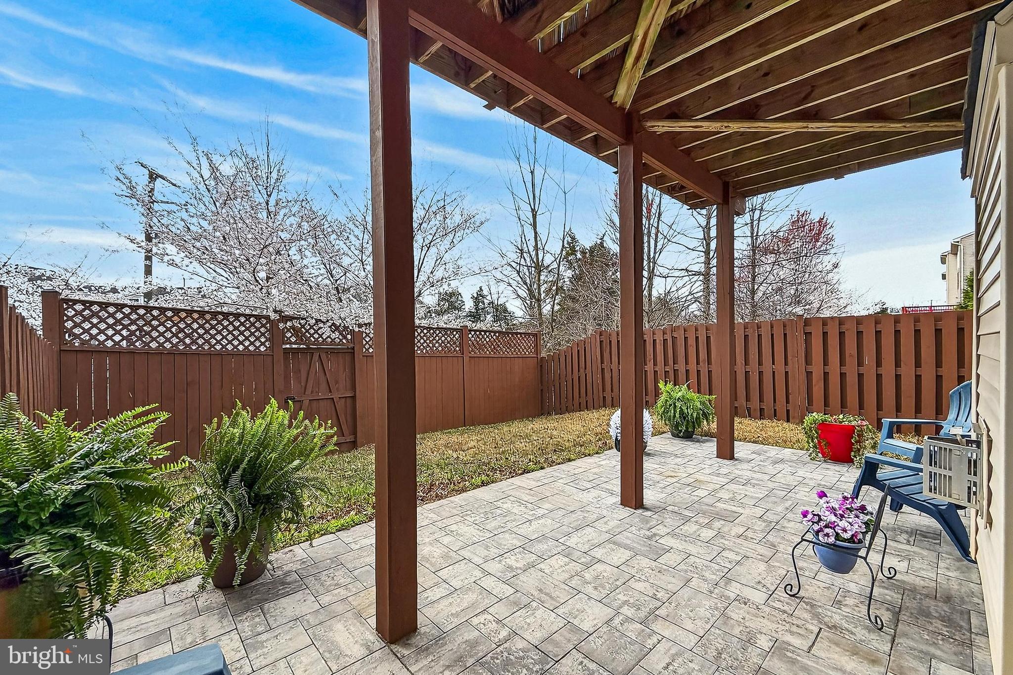 43473 Hopestone Terrace Chantilly, VA 20152 - Photo 43 of 49 a view of a backyard with sitting area