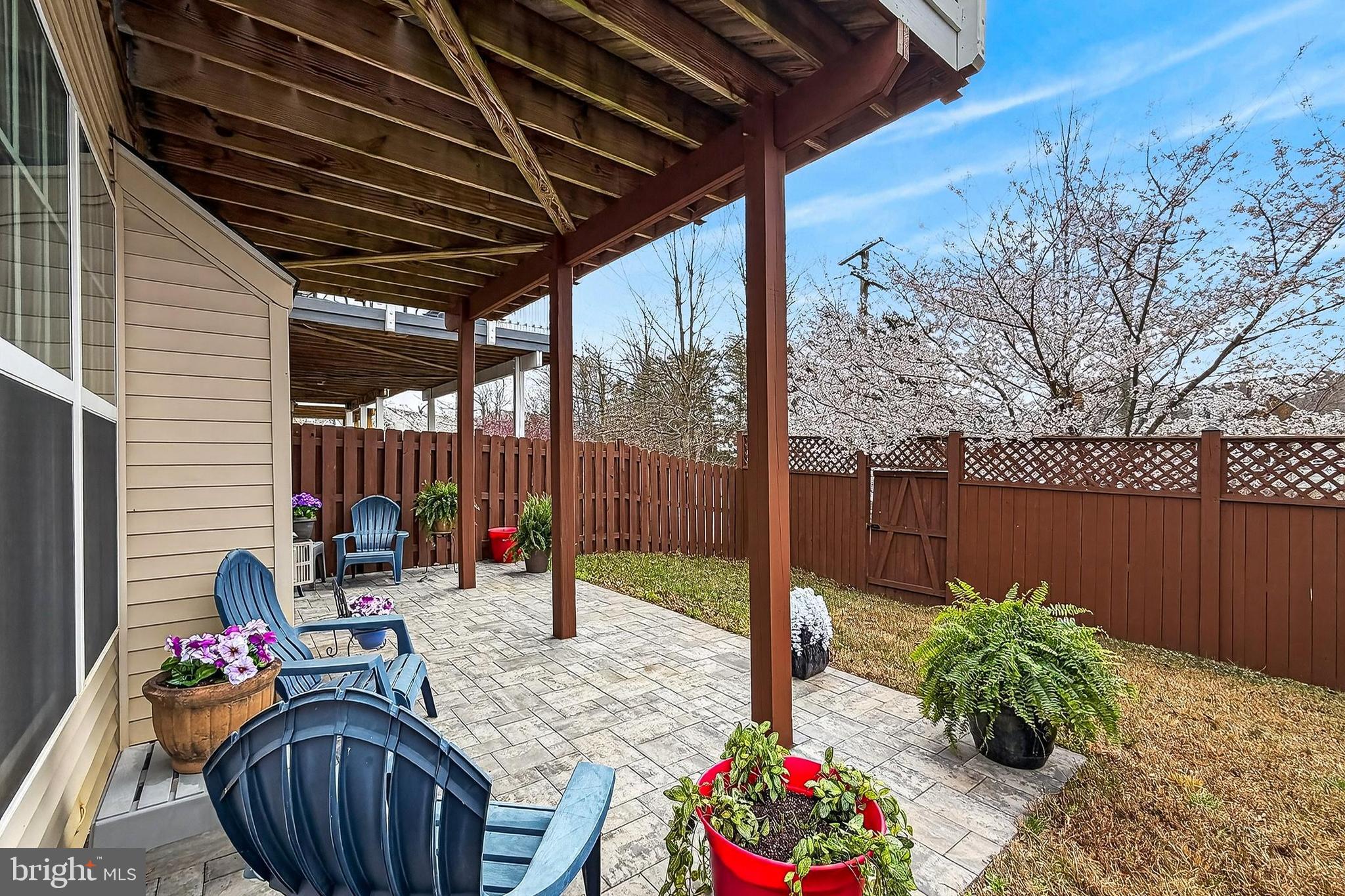 43473 Hopestone Terrace Chantilly, VA 20152 - Photo 44 of 49 a backyard of a house with seating space