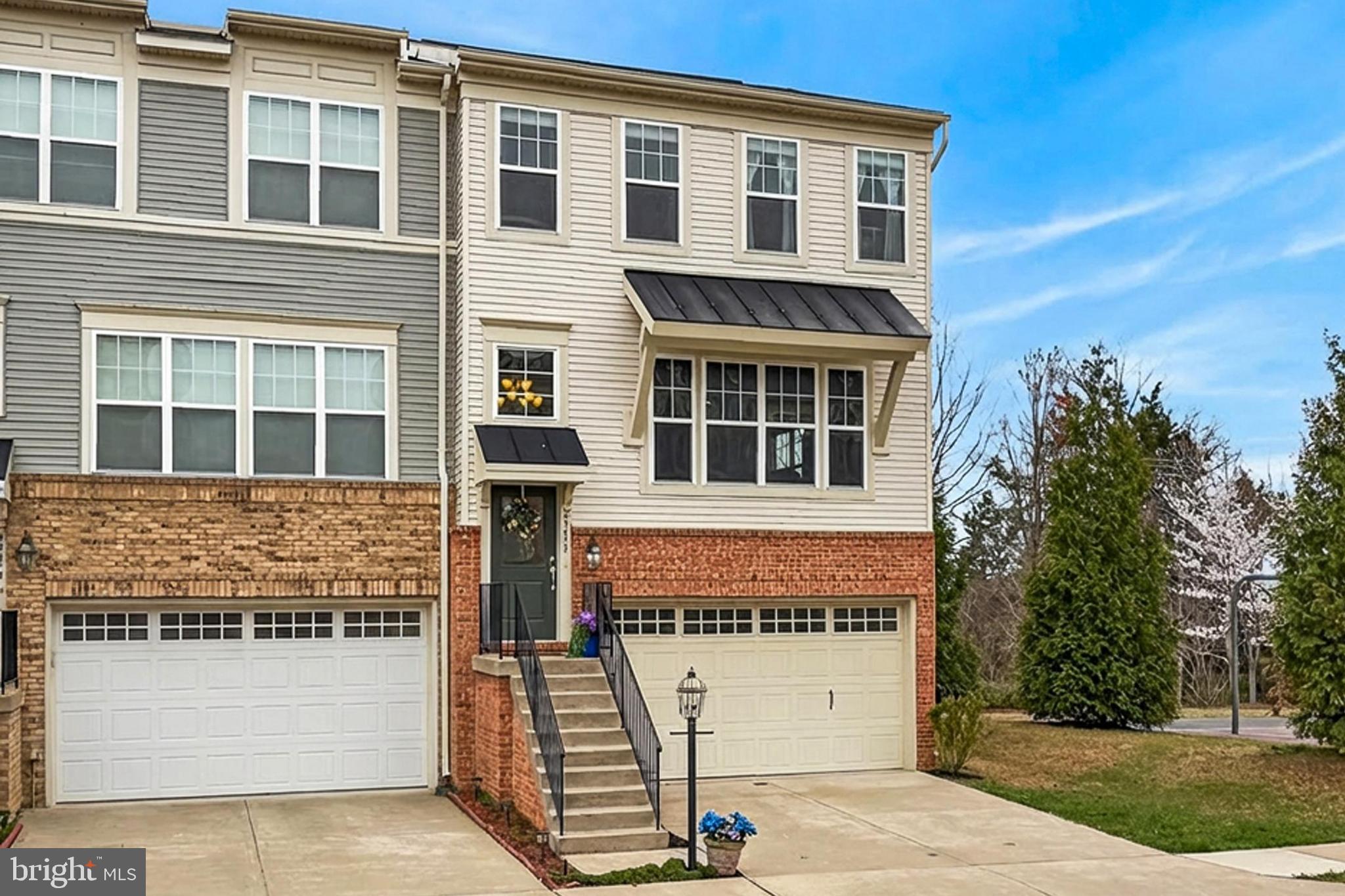 43473 Hopestone Terrace Chantilly, VA 20152 - Photo 5 of 49 a front view of a building