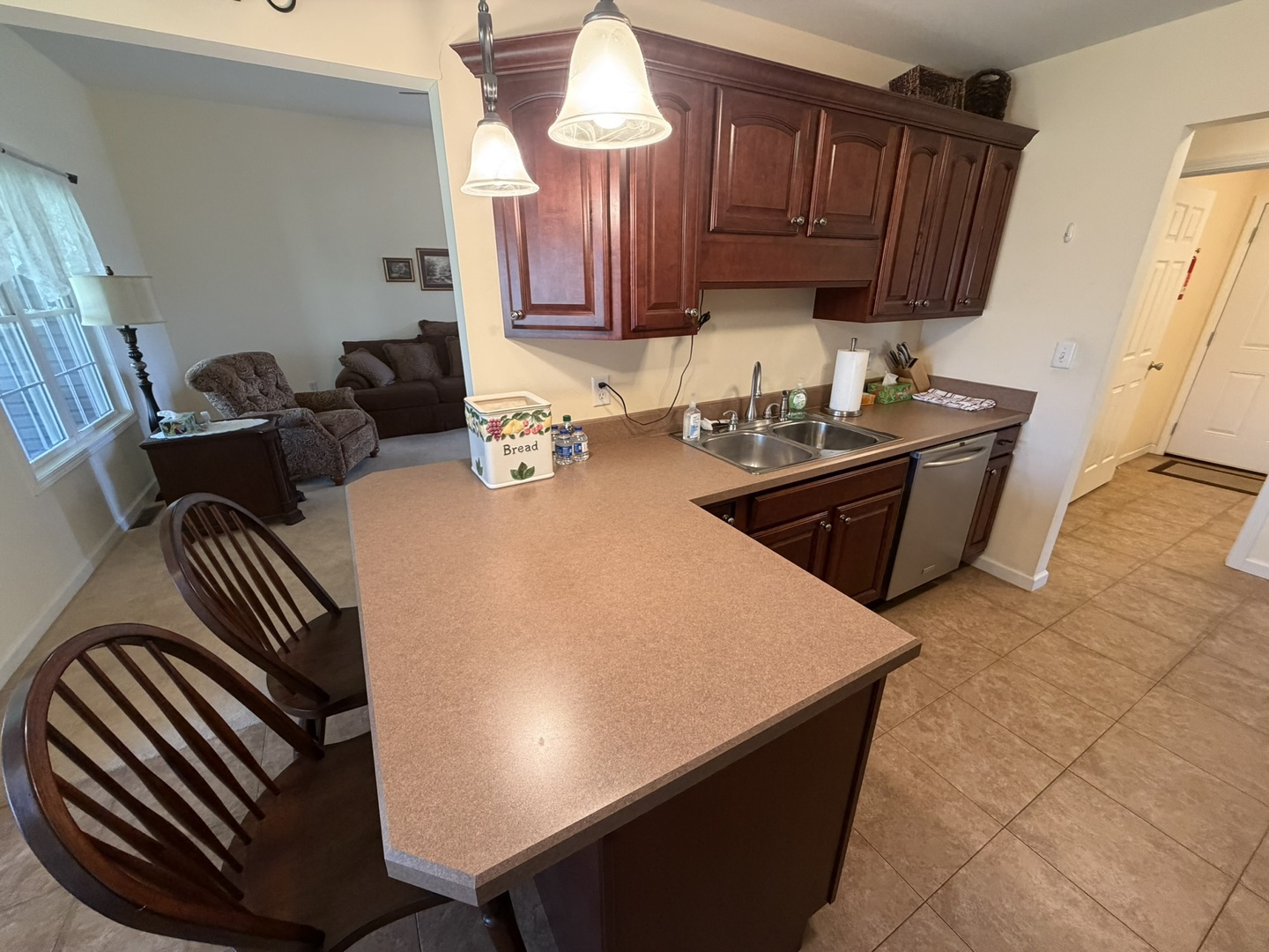 2 Dove Lane Metropolis, IL 62960 - Photo 11 of 35 a kitchen with a sink a stove and a cabinets