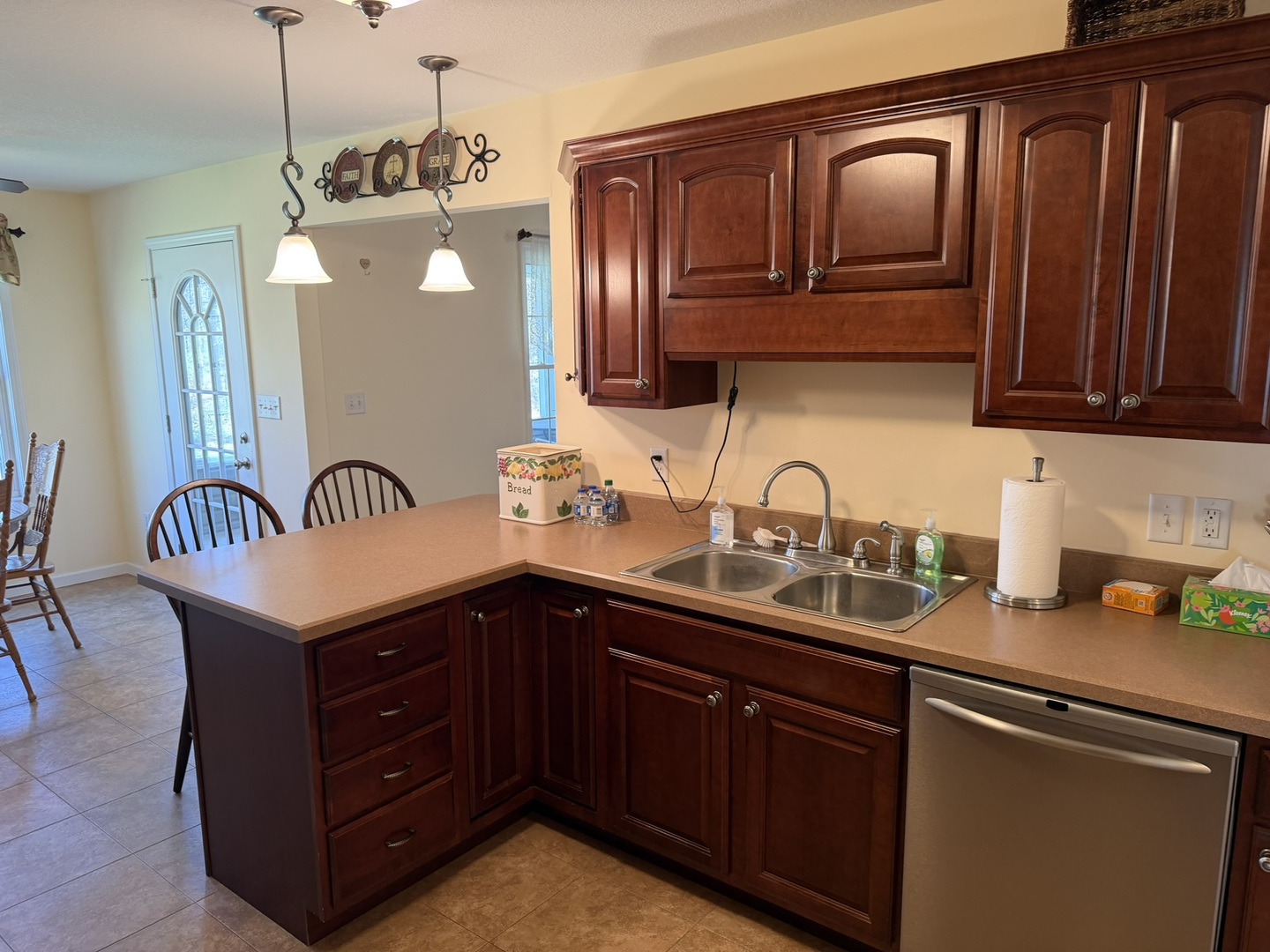 2 Dove Lane Metropolis, IL 62960 - Photo 12 of 35 a kitchen with granite countertop a sink stainless steel appliances and cabinets