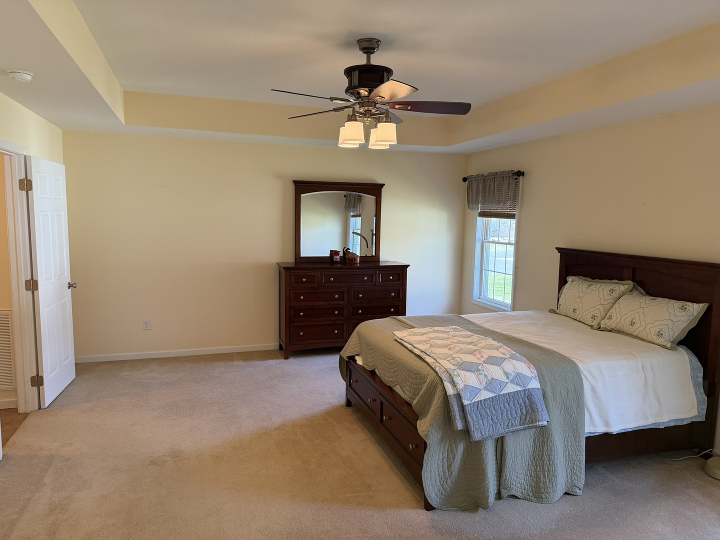 2 Dove Lane Metropolis, IL 62960 - Photo 16 of 35 a bedroom with a bed and a chandelier