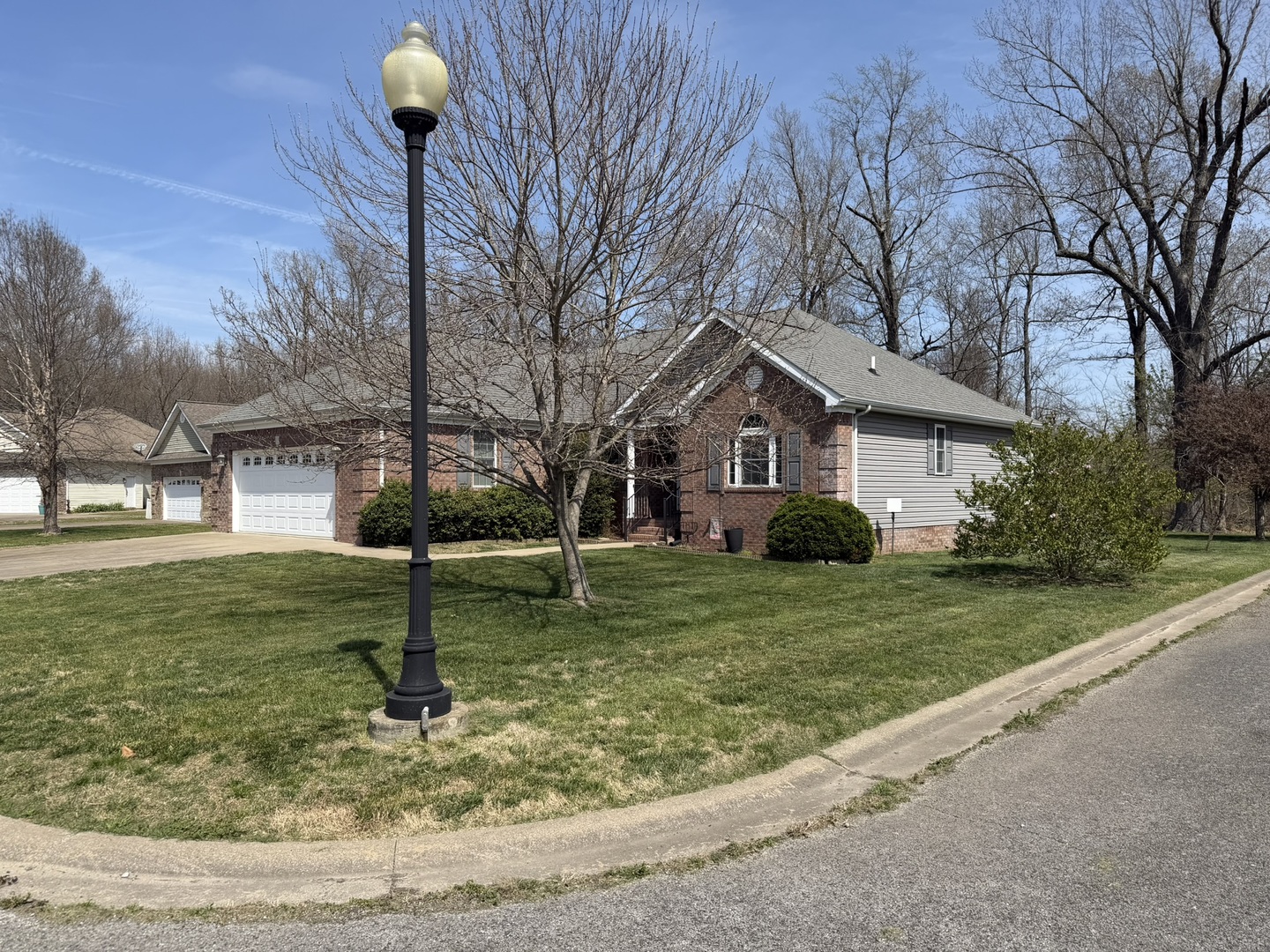 2 Dove Lane Metropolis, IL 62960 - Photo 2 of 35 a front view of a house with a yard