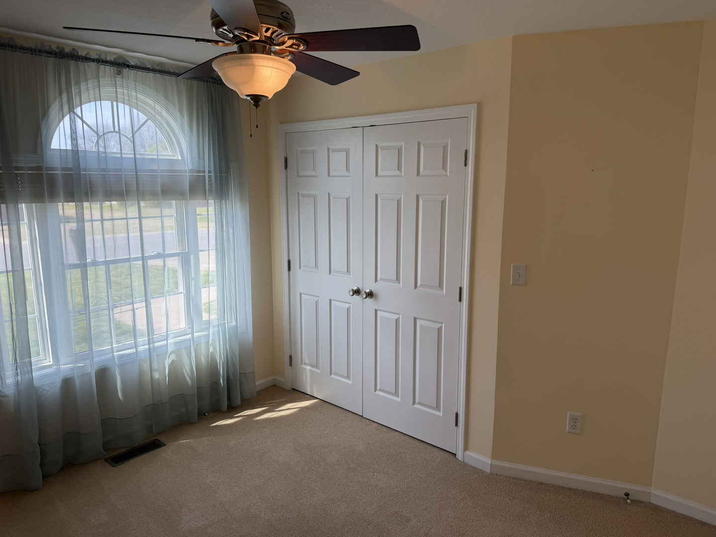 2 Dove Lane Metropolis, IL 62960 - Photo 23 of 35 a view of a livingroom with a chandelier fan and a window