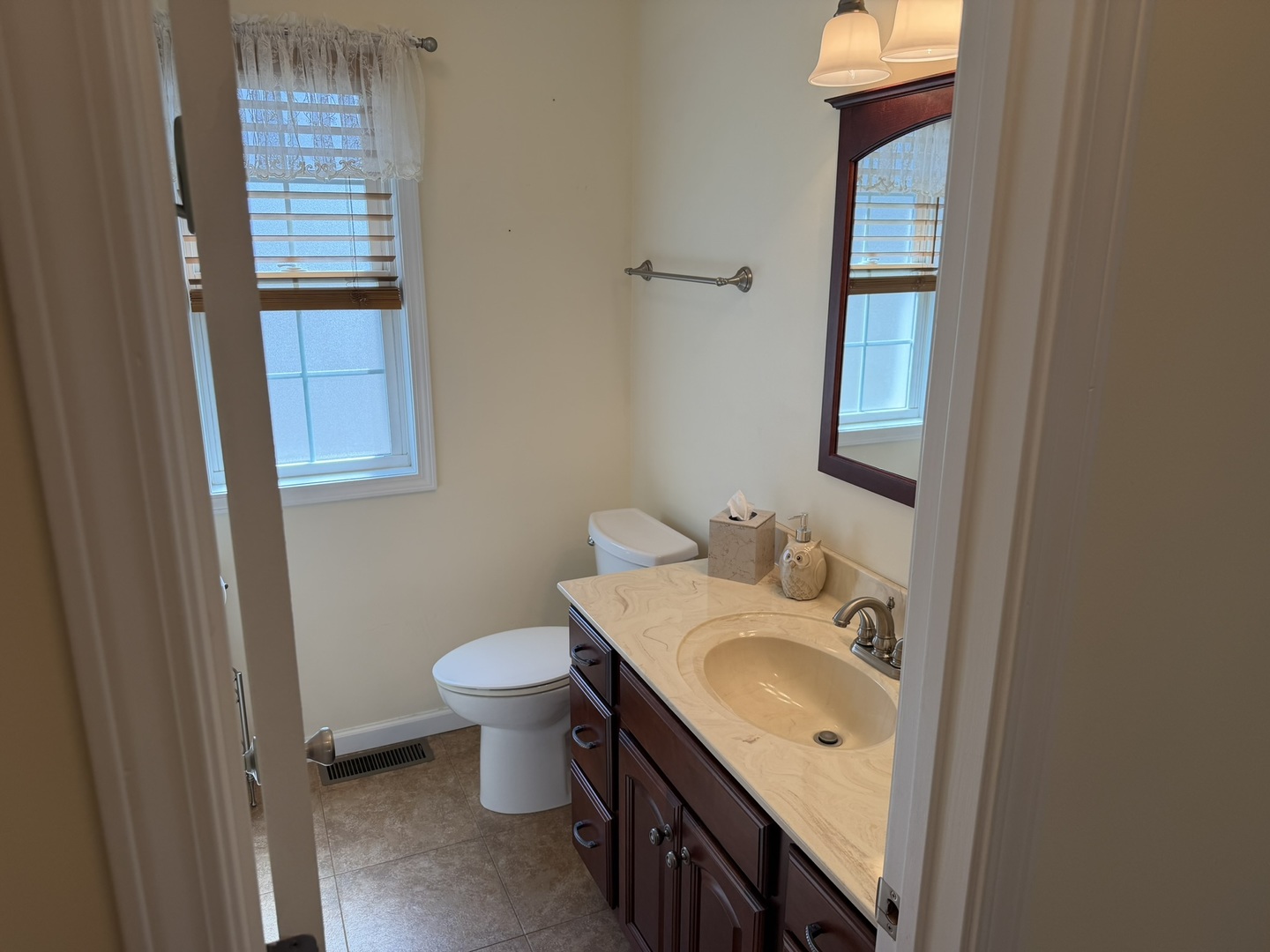 2 Dove Lane Metropolis, IL 62960 - Photo 25 of 35 a bathroom with a sink toilet and vanity