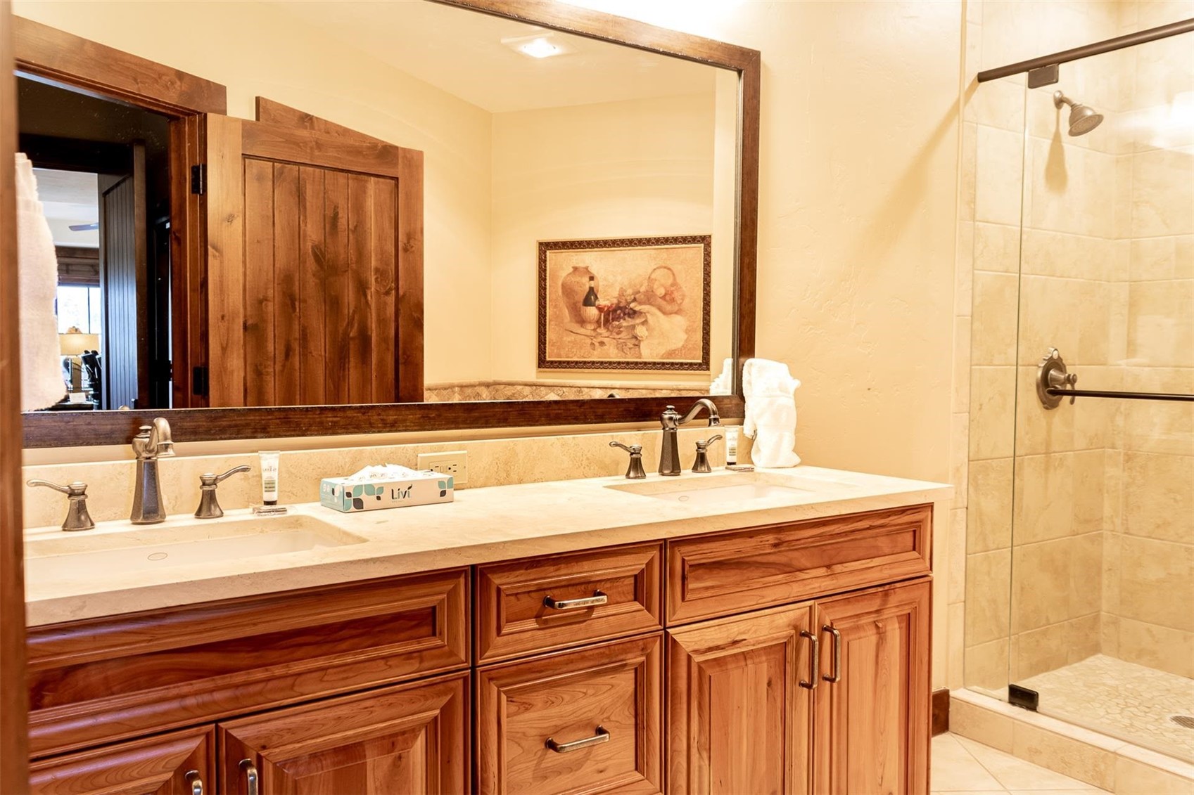 1891 Ski Hill Road, Unit 7000 Breckenridge, CO 80424 - Photo 15 of 25 a bathroom with a sink and a mirror